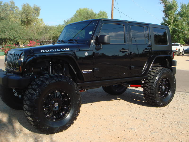 Jeep Wrangler Unlimited w/ XD Hoss Wheels and Nitto Mud Grappler Tires