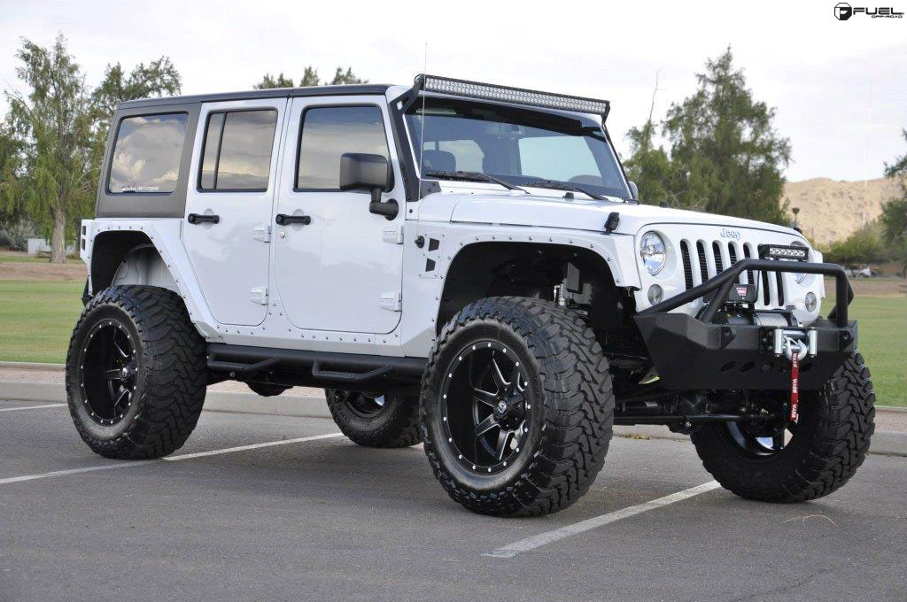 This 2014 Jeep Wrangler with Fuel Wheels and Tires is a Monster