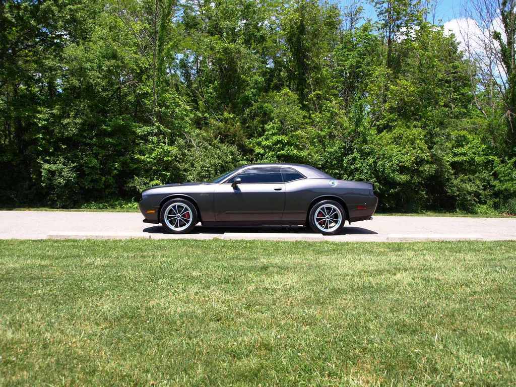 Feel the Muscle w/ this Challenger on American Racing Wheels!