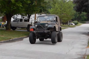 Jeep Wrangler with custom wheels and Lexus V8